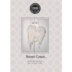 A Sweet Grace scent sachet.The sachet is a pale cream colour with an image which shows a pair of fluffy angel wings hanging from a door knob. The text reads ' BRIDGEWATER CANDLE COMPANY Sweet Grace Scented Sachet'.