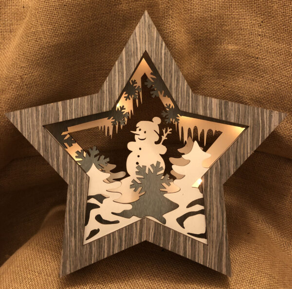 A Grey wooden, light-up star with Snowman detail.