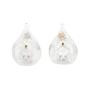 A pair of clear glass ornaments on a white background.