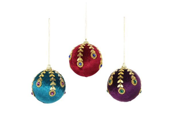 Three bejewelled baubles in various rich colours hanging on a white background.