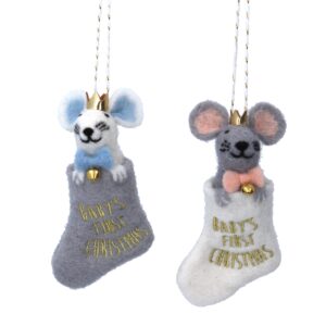 A pair of felt Baby's First Christmas Mice in Stockings. The Mouse on the left is white with blue ears and a blue bow with a gold bell and gold crown and is sitting inside a grey stocking with the words 'BABY'S FIRST CHRISTMAS' embroidered in gold thread. The Mouse on the right is grey with pink ears and a pink bow with a gold bell and gold crown and is sitting inside a white stocking with the words 'BABY'S FIRST CHRISTMAS' embroidered in gold thread.