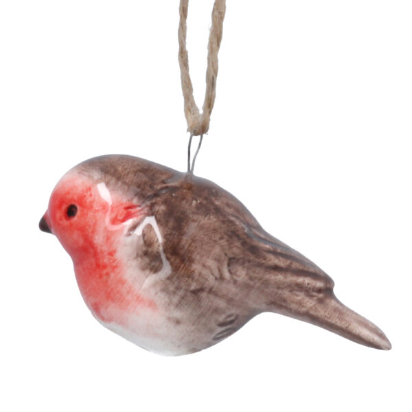 A Little Ceramic Robin, tree decoration hanging from a string on a white background.