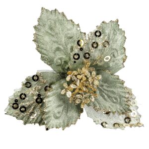 A close up of a sage green Christmas flower with gold glitter and sequin decoration.