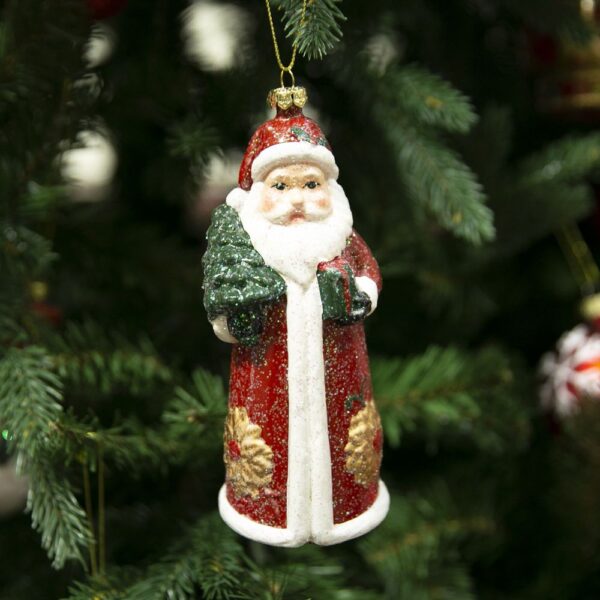 A Traditional Santa tree decoration hanging on a Christmas tree.