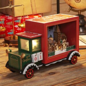 A battery operated light up Wooden Christmas truck with an countdown advent calendar on it.