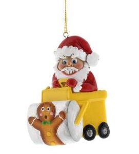 Bad Santa in a yellow road roller running over a gingerbread man hanging Christmas decoration.