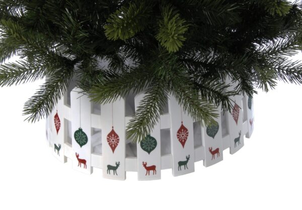 A 54cm x 22cm plastic white picket fence tree skirt decorated with red and green Christmas baubles and reindeer decal.