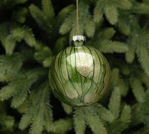 A large glass green mrble effect Christmas tree bauble.This clear glass bauble has a green alcohol ink effect on the glass and is back filled with gold glitter giving the bauble a marble effect.