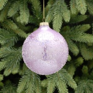 A pale pink, textured glass Christmas tree bauble. This bauble is textured to resemble a snowball and has an iridescent finish.