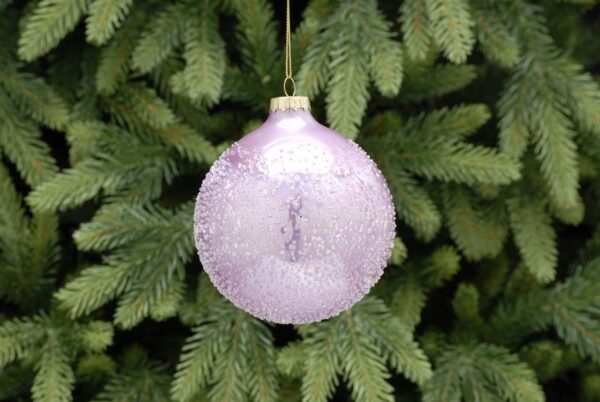 A pale pink, textured glass Christmas tree bauble. This bauble is textured to resemble a snowball and has an iridescent finish.