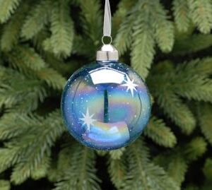 A clear iridescent blue glass Christmas tree bauble decorated with white starbursts and stars.