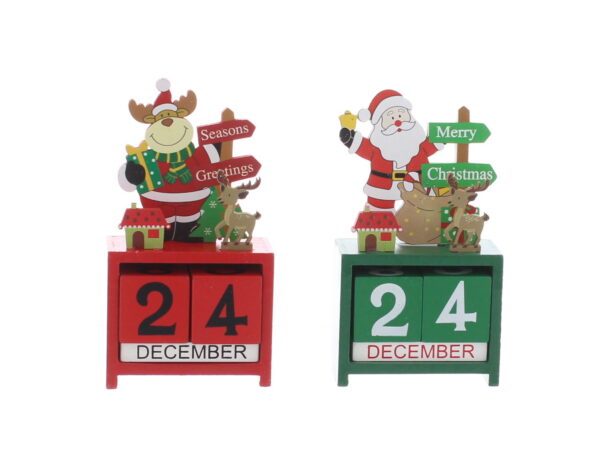 Wooden Advent Block Calendars in two designs. The one on the left is red and features Rudolph wearing a red Santa suit and holding a green present with a yellow bow. He is standing next to a red sign that reads 'Seasons Greetings' in white text. In front of Rudolph and the sign is a small green house and a little brown reindeer. They all sit on top of a red wooden box containing the two number blocks for counting down the days of advent and the block sit on top of another white block that says 'DECEMBER'. The one on the right is green and features Santa Claus holding a yellow bell. He is standing next to a green sign that reads 'Merry Christmas' in white text. In front of Santa and the sign is a small green house and a little brown reindeer. They all sit on top of a green wooden box containing the two number blocks for counting down the days of advent and the block sit on top of another white block that says 'DECEMBER'.