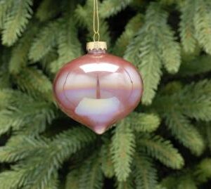 An iridescent, dusky pink, onion shaped, glass Christmass tree bauble hanging from a gold string.