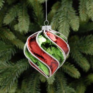 An onion shaped, twisted and segmented blown glass Christmas tree bauble decorated in alternating metallic red and green segments with white glitter detail along each ridge.