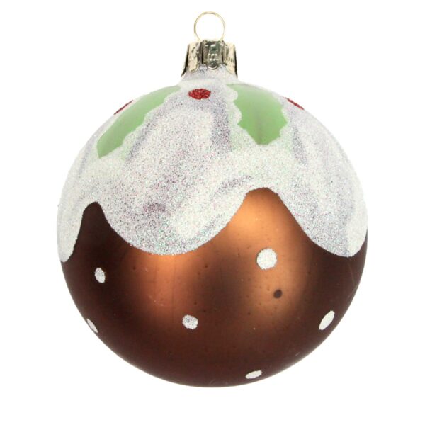 A matt brown, glass Christmas tree bauble decorated to look like a traditional Christmas pudding with a top of white iridecent glitter for the icing with matt green holy leaves and red glitter on the top and while glitter polka dots all over the bottom.