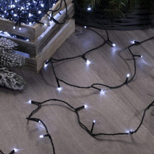 200 Bright White Fairy Lights (LED) in a crate on a wooden floor.