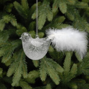 An Icy Effect Glass Bird with White Feathers ornament gracefully hanging from a tree branch, adorned with delicate white feathers.