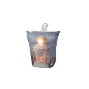 A LED Plush Lantern Doorstop with an image of a white lantern against a snowy back drop, The LED light sits behind the light in the image so that the lantern in the image lights up when it's turned on. Has a white fabric tab at the top for carrying or hanging.