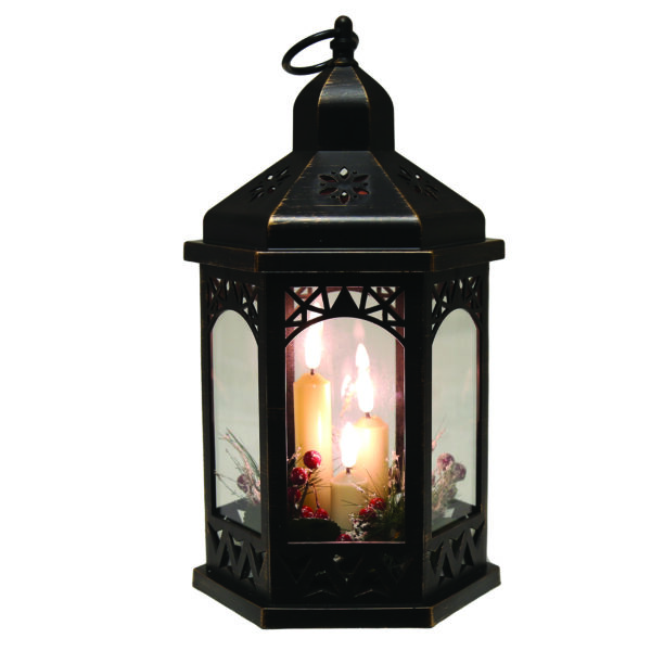 A Metallic-look Black Hexagonal LED Candle Lantern. This lantern has three LED candles inside that are differents height and battery operated. Around the candles there is a some festive fir sprigs and red berry decoration. The panels of the lantern have fretwork arches at the top and fetwork chevrons at the bottom. the lid also has cut away deatail that lets the light shine out. The lantern is black with gold detail on the edges to give it an aged metallic look.