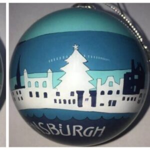 Beautiful Handpainted Helensburgh Skyline Bauble designed by Hiya Pal featuring the front off Helensburgh in white set against a backdrop of hills and sky in various shades of blue. Santa Claus and his reindeer are flying over head and the white text at the bottom reads 'HELENSBURGH'