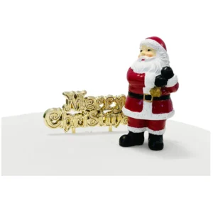 A polyresin Santa Claus cake decoration. Santa is dressed in his traditional red outfit with a sack of presents over his shoulder. He is stood next to a gold plastic Merry Christmas motto cake decoration.