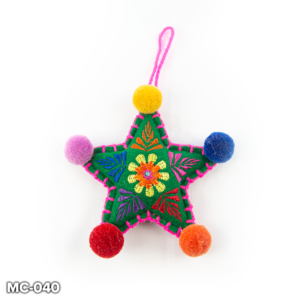 An green felt, star shaped Christmas tree decoration. This green felt star has a yellow and orange flowwer embroidered in the centre with colourful leaves embroidered in the points in orange, pink, red, purple and blue. It has pink stitching around the outside. At the top there is a loop of pink wool for hanging and the end of each point there is a colourful pompom in yellow, blue, orange, red and pink.