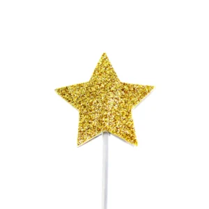 A glittery gold star shaped cake decoration pick.