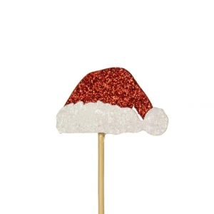 A glittery red and white Santa Hat shaped cake decoration pick.