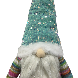 A free standing plush gonk decoration. This gonk has white furry boots with blue and purple laces and is wearing a pastel multicoloured striped jumper. His beard is white and fluffy and has traces of silver tinsel running through it. His round pink nose pokes out from beneath his hat. His hat is covered in blue iridescent sequins that sparkle in the light. It has a white fur trim wiht matching pompom.