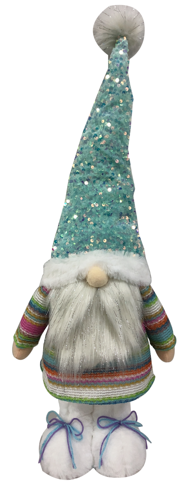 A free standing plush gonk decoration. This gonk has white furry boots with blue and purple laces and is wearing a pastel multicoloured striped jumper. His beard is white and fluffy and has traces of silver tinsel running through it. His round pink nose pokes out from beneath his hat. His hat is covered in blue iridescent sequins that sparkle in the light. It has a white fur trim wiht matching pompom.