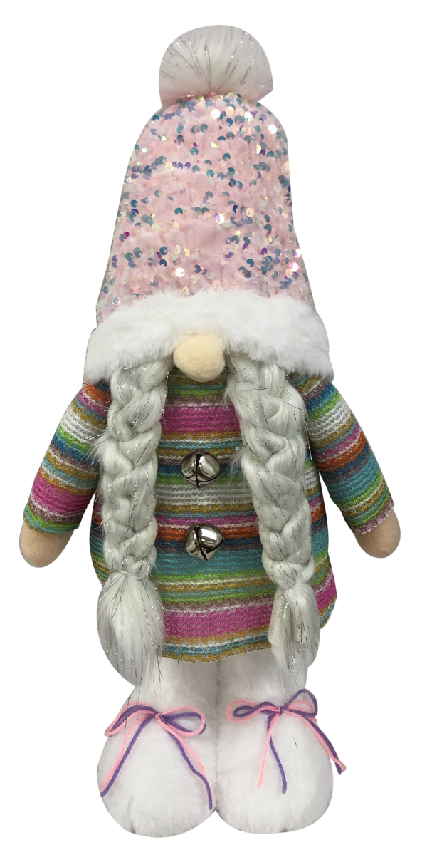 A free standing plush gonk decoration. This gonk has white furry boots with pink and purple laces and is wearing a pastel multicoloured striped jumper with two silver bells for buttons. Her hair is white and has traces of silver tinsel running through it. It sits in two plaits either side of her round pink nose which pokes out from beneath her hat. Her hat is covered in pink iridescent sequins that sparkle in the light. It has a white fur trim with matching pompom.