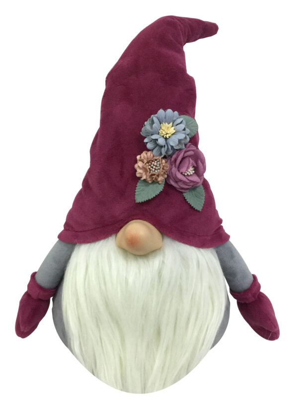 A burgundy coloured Christmas Gonk with flowers. The body of this gonk is grey with burgiundy coloured mittens at the end of each arm. It has a fluffy cream coloured beard which sits beneath its pink nose. On it's head it has a pointy burgundy hat that has a small posy of blue, purple and pink flowers with green leaves that sits above the nose on the left hand side.