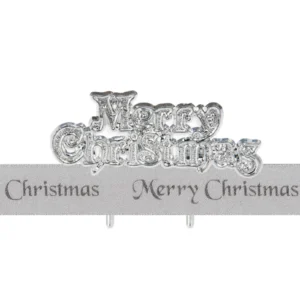 Silver Cake Ribbon with the words 'Merry Christmas' printed on it in darker silver next to a plastic Merry Christmas motto Cake Topper.