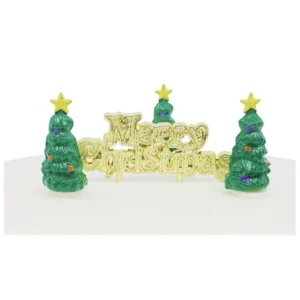 A set of three, polyresin, green Christmas Tree cake decorations. Each green tree has a yellow star on top and has purple and orange baubles on it's branches. They sit around a gold plastic Merry Christmas cake decoration motto.