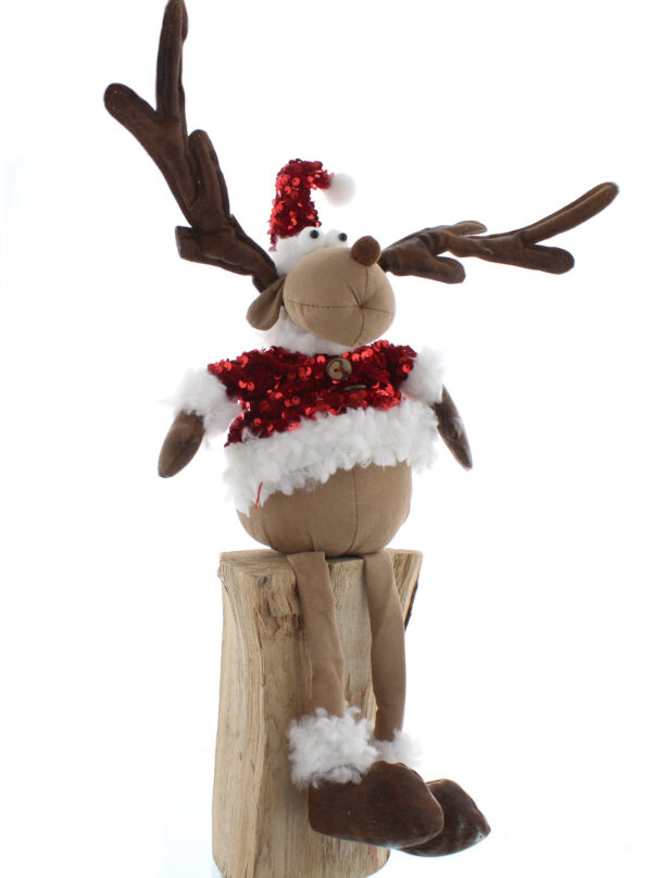 A plush reindeer figurine with brown felt antlers and a red sequined coat with fluffy white trim and matching Santa hat. He has long legs that dangle when he sits.