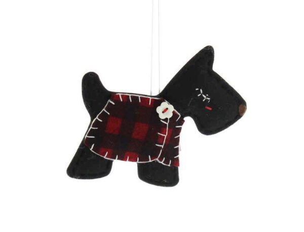 A black felt fabric Christmas tree decoration in the shape of a Scottie dog with a red tartan fabric coat with white sticthing detail finished with a white flower shaped button. The dog has white stitching eyelashed and a brown felt nose.