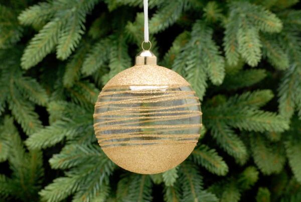 A clear glass Christmas tree bauble decorated with gold glitter covering the top and bottom third of the bauble with a fine line of spun gold glitter around the centre connecting the top and bottom.