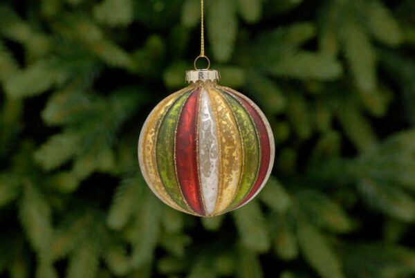 A round shaped, segmented, mercury style glass Christmas tree bauble decorated with each segmant as a different colour of red, white, gold and green reapeating all the way around.