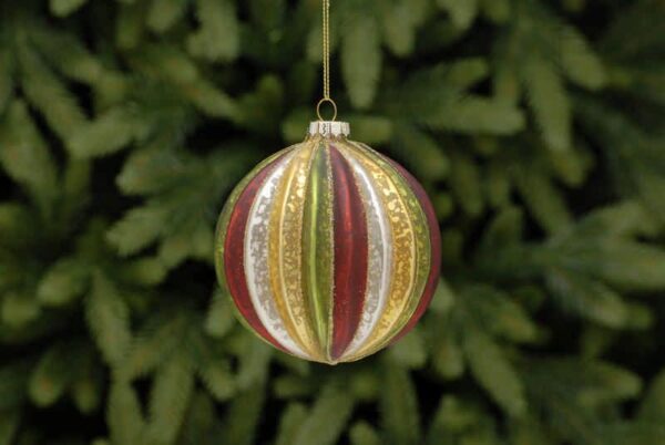 A round, segmented, mercury style glass Christmas tree bauble decorated with each segmant as a different colour of red, white, gold and green reapeating all the way around.