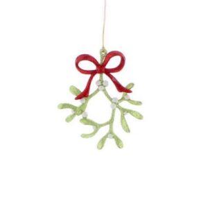 An acrylic sprig of mistletoe decorated in pale green glitter with white glitter berries and a red glitter bow hanging from a gold string.