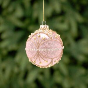 A pink mercury effect glass Christmas tree bauble decorated with fine lines of gold glitter adorned with gold beads and sequins. It has a string of white diamante jewels around its centre.