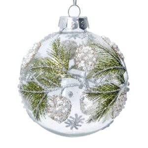 A clear glass Christmas tree bauble decorated with a pattern of green glitter fir branches and glittering white beaded berries all over the surface. Surrounded by silver glitter snowflakes.