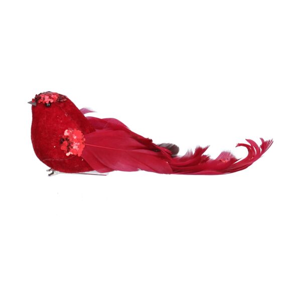 A red clip on feathered bird with red glitter detail on it's head and wings. It has long red feathers on its wing and tail.