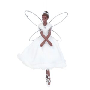 A polyresin ballerina fairy princess wearing a white fur trimmed velour fabric dress with white bead deatail at her waist, with a white fur stole over her bodice complete with silver diamante jewel. She has simple wire frame wings decorated in silver glitter and wears a pearl and diamante tiara in her hair.