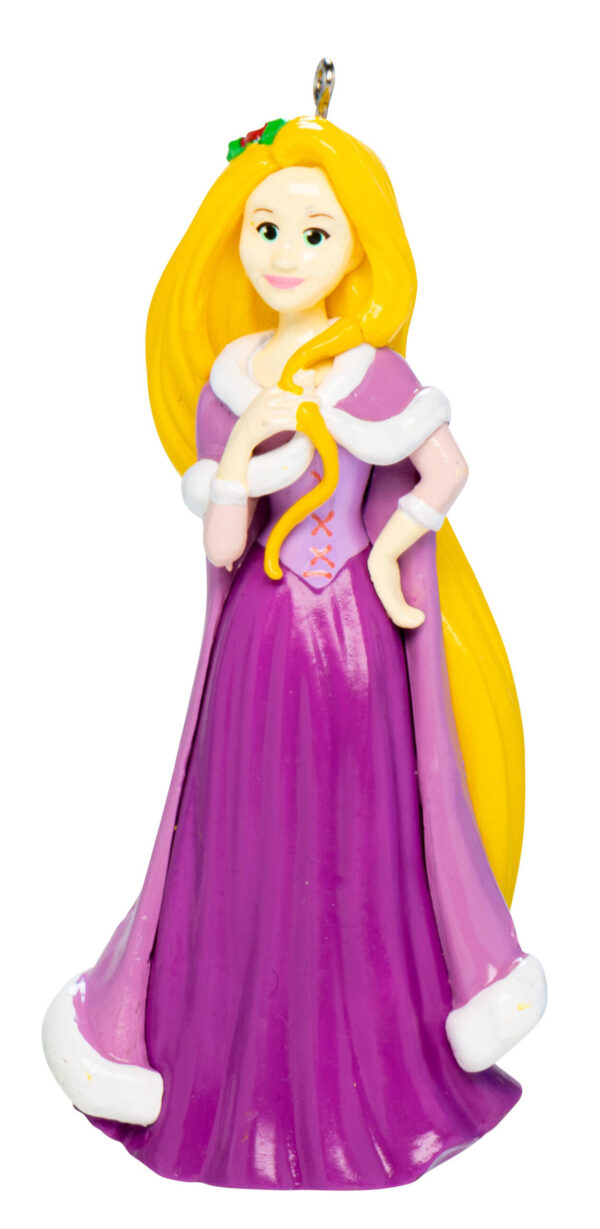 A polyresin Christmas tree decoration depicting Disney's Rapunzel. She is wearing a long purple dress with matching cloak. Her long blond hair cascades down behind her and his decorated with a sprig of holly.