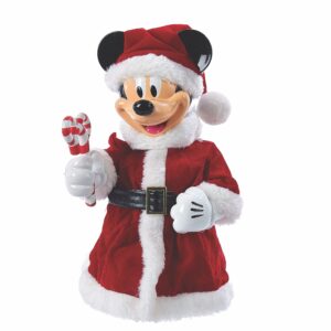 A 3D Christmas Tree Topper in the shape of Disney's Mickey Mouse. He is wearing a red velour Santa suit with white fur trim ans a matching Santa hat and is holding a red and white striped candy cane in the shape of mouse ears.