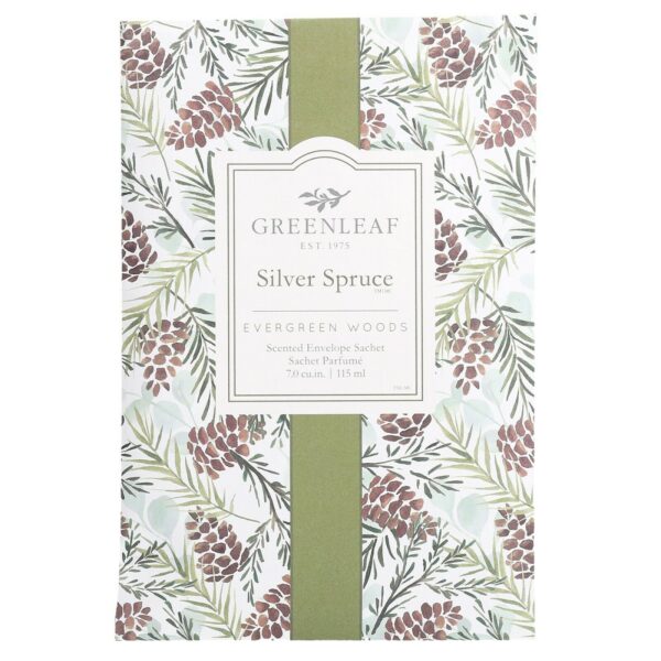 A Silver Spruce fragranced scent sachet showing a painted image of brown pine cones and green pine needles on a white background. A green band runs vertically down the middle of the image and on top of the band sits a white coloured box. At the top of the box in black is the logo for the Greenleaf Company and beneath that in green is text that reads 'Silver Spruce™ EVERGREEN WOODS' and in black beneath that 'Scented Envelope Sachet Sachet Parfume 7.0CU.IM. 115ML'.