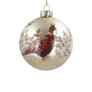 A pale gold coloured glass Christmas tree bauble featuring an image of a Pheasant with gold glitter detail on its crown and wings amongst dark gold foliage also with gold glitter detail. The base of the bauble is finished with gold leaf.