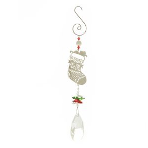 Crystal Suncatcher Window Decoration - Christmas Stocking Design. This suncatcher has a large faceted crystal at the bottom of its pendulum, held beneath a cluster of smaller green, red and white crystals. They hang beneath a Christmas Stocking motif made of fine filigree metal. This is attached to the hanging hook at the top by some festive beads. Shown against a white background