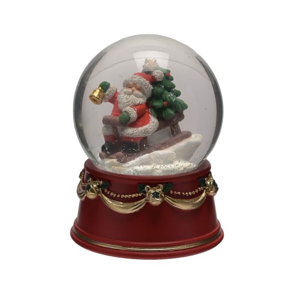 Jolly Santa on Sleigh Snow Globe - 10cm Turn this snow globe upside down and watch Jolly Santa fly by on his sledge. He is ringing out joy with his golden bell and carries a decorated tree on the back of his sleigh. This lovely  snow globe is 10 cm tall and sits on a red resin plinth decorated with gold swags and holly leaves. 